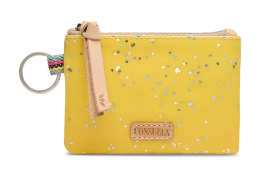 Yellow glittery pouch with a keychain and visible brand logo on a white background