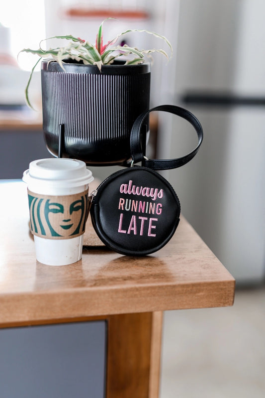 Black Wristlet Pink Embroidered Text "Always Running Late"